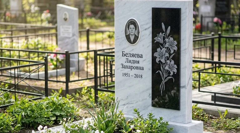 Памятник с гравировкой лилий — выполненная работа «Беляева» в Кемерово