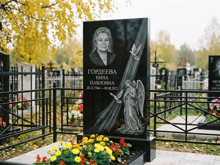 Памятник с гравировкой ангела — гравировка ангела с голубем по диагонали стелы, работа «Гордеева» в Кемерово